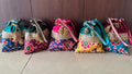 Dual fabric Patola Potlis