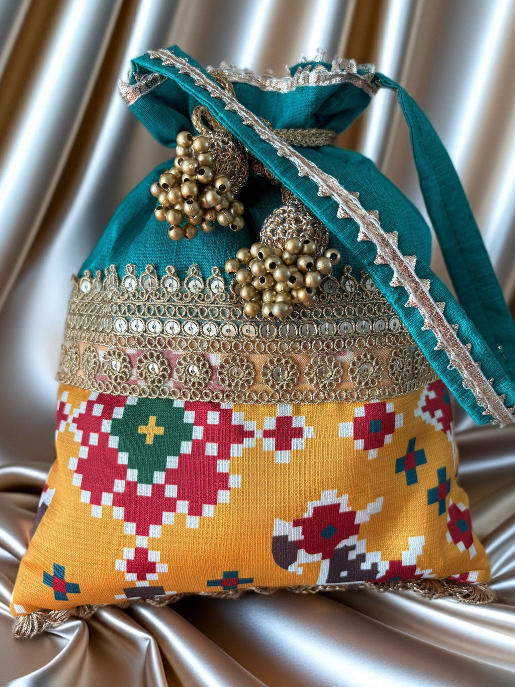 Dual fabric Patola Potlis