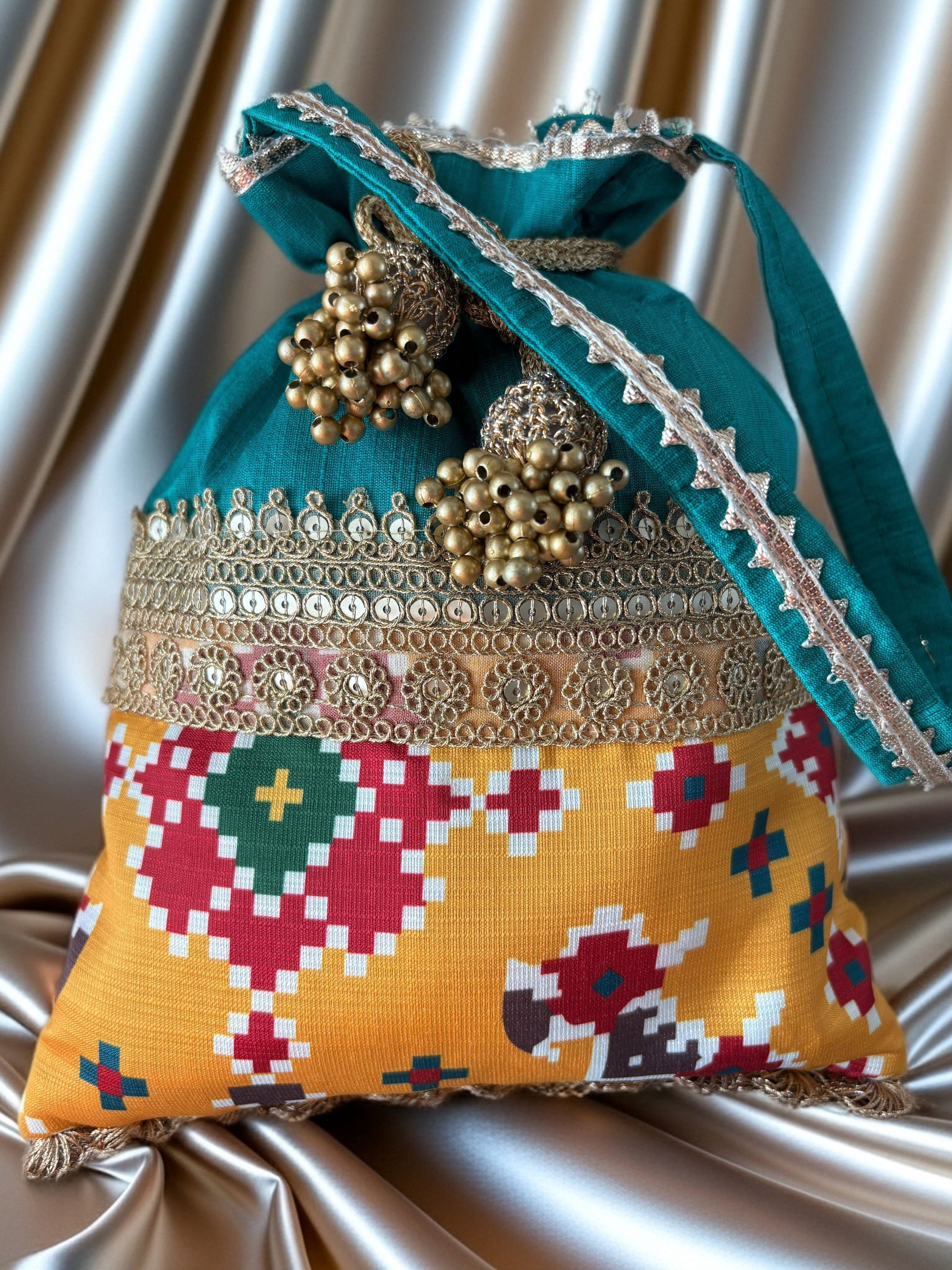 Dual fabric Patola Potlis